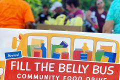 Volunteers pack up food donations for transport during the 15th annual Fill the Belly Bus Community Food Drive on Friday afternoon at the Greenfield Common.