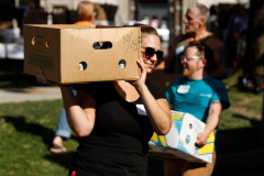 Volunteers sort through food donations during the 15th annual Fill the Belly Bus Community Food Drive on Friday afternoon at the Greenfield Common.