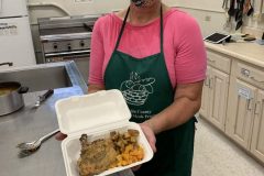 Linda Kelly serving meals in Greenfield.