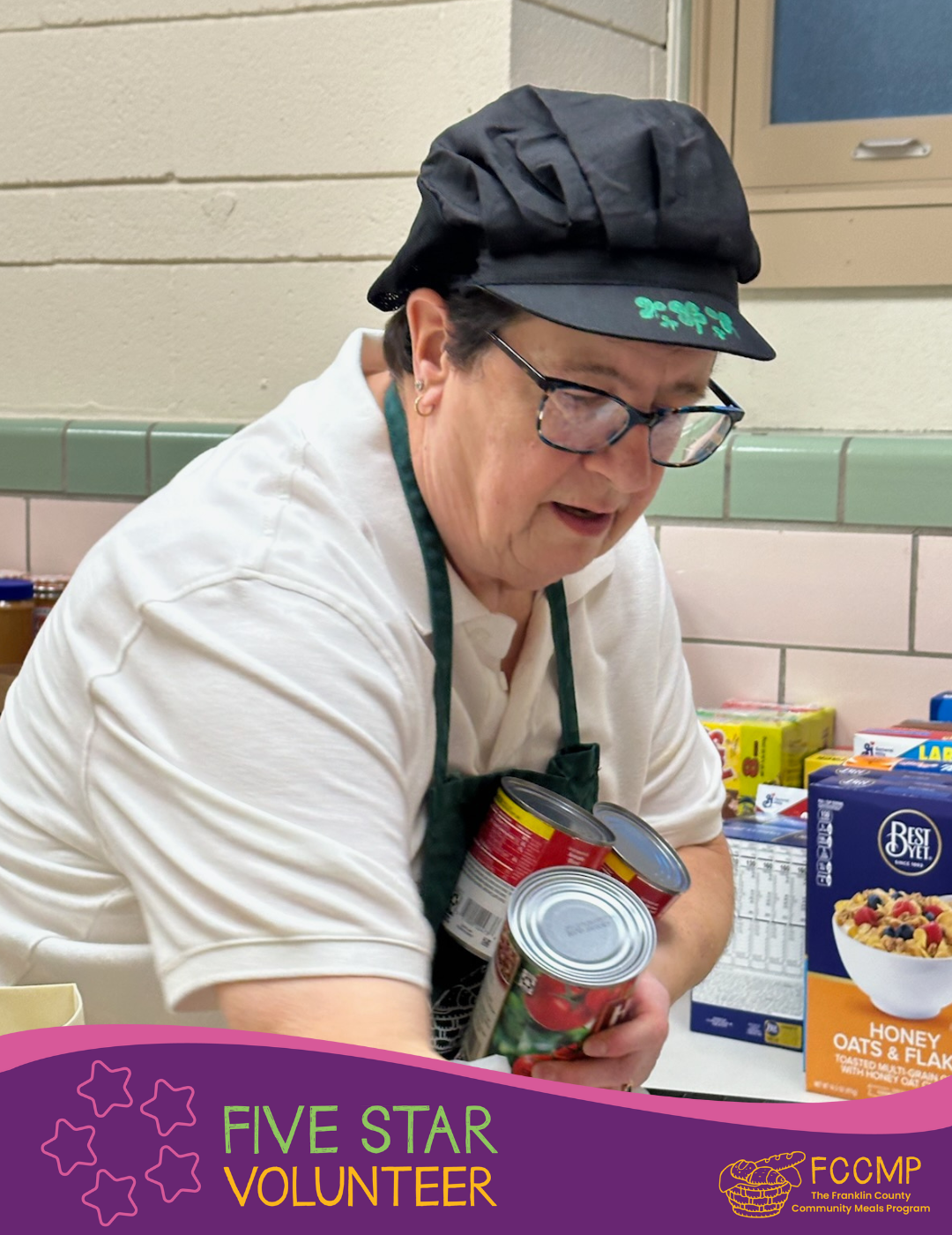 Cathy Marcum, organizing groceries at Our Lady of Peace, Turners Falls