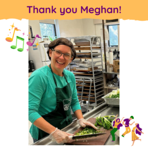 Meghan Williams, smiling and chopping vegetables to get cooked into delicious meals for the community
